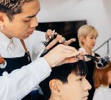 Inicio 9 httpselements.envato.comasian male customer getting hair cut with hairdres DVQHYR8