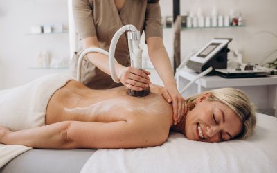 Hardware figure correction with vacuum her back massage. Overweight treatment, body sculpting Hardware figure correction with vacuum her back massage. Overweight treatment, body sculpting